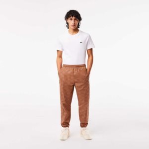 Lacoste Monogram Print tracking Pants ανοιχτο καφε | IQ7198542