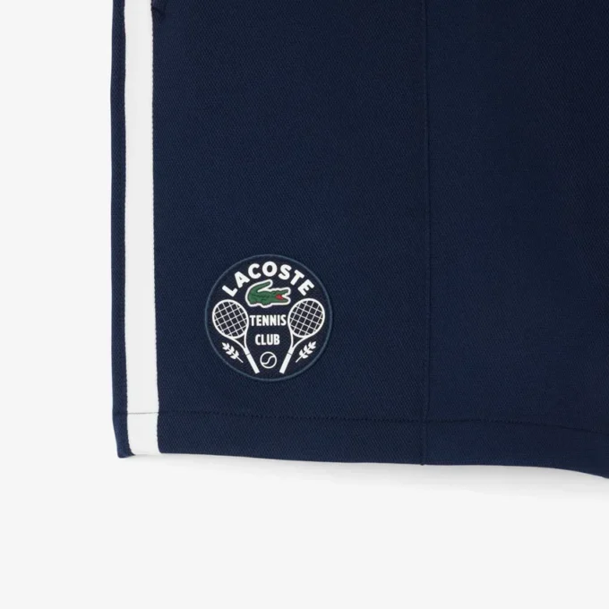 Ανδρικά σορτς τένις Heritage με λεπτομέρεια Ultra Dry Badge Ανδρικά σορτς τένις Heritage με λεπτομέρεια Ultra Dry Badge