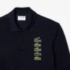 Ανδρική Polo Μπλούζα Original L.12.12 με μακριά μανίκια και πολλαπλά εμβλήματα Ανδρική Polo Μπλούζα Original L.12.12 με μακριά μανίκια και πολλαπλά εμβλήματα