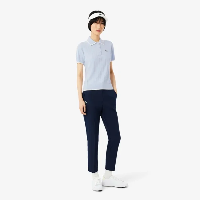 Γυναικείο πουλόβερ γκολφ με κοντό μανίκι και γιακά πόλο Γυναικείο πουλόβερ γκολφ με κοντό μανίκι και γιακά πόλο