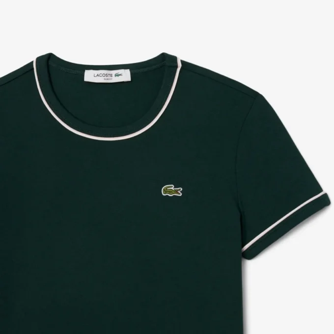 Γυναικείο T-shirt από jersey με διακοσμητικές λεπτομέρειες σε αντίθεση Γυναικείο T-shirt από jersey με διακοσμητικές λεπτομέρειες σε αντίθεση
