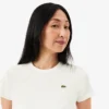 Γυναικείο T-shirt από βαμβάκι με ραβδώσεις και στενή εφαρμογή Γυναικείο T-shirt από βαμβάκι με ραβδώσεις και στενή εφαρμογή