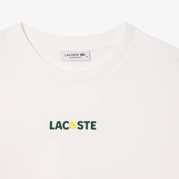 Γυναικείο βαμβακερό oversized T-shirt με τύπωμα μπάλας Γυναικείο βαμβακερό oversized T-shirt με τύπωμα μπάλας