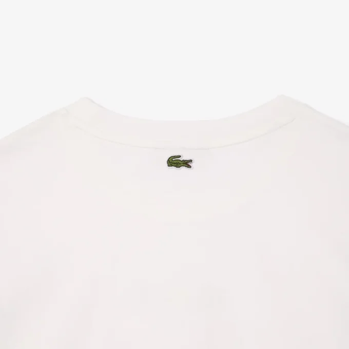 Γυναικείο βαμβακερό oversized T-shirt με τύπωμα μπάλας Γυναικείο βαμβακερό oversized T-shirt με τύπωμα μπάλας