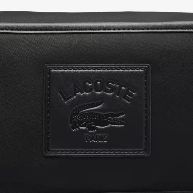 Κλασική τσάντα Lacoste με πτερύγιο κλεισίματος Κλασική τσάντα Lacoste με πτερύγιο κλεισίματος