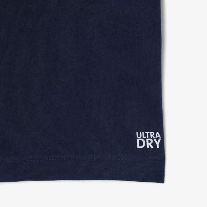 Παιδικό αθλητικό T-shirt από τεχνικό βαμβάκι Ultra Dry Παιδικό αθλητικό T-shirt από τεχνικό βαμβάκι Ultra Dry