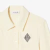 Πolo Μπλούζα με κεντημένο σχέδιο και στενή γραμμή Πolo Μπλούζα με κεντημένο σχέδιο και στενή γραμμή
