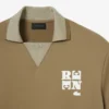 Πolo Μπλούζα με υπερμεγέθη σατέν λεπτομέρεια Runway Badge Πolo Μπλούζα με υπερμεγέθη σατέν λεπτομέρεια Runway Badge