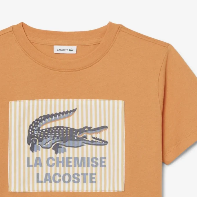 T-shirt από βαμβάκι με διακοσμητικό έμβλημα T-shirt από βαμβάκι με διακοσμητικό έμβλημα