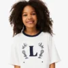 T-shirt από βαμβάκι με έμβλημα σε αντίθεση T-shirt από βαμβάκι με έμβλημα σε αντίθεση